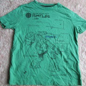 Green Short Sleeve shirt, size 5 with design.